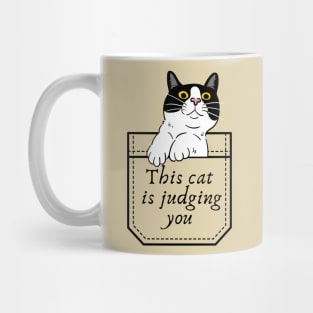 This cat is judging you Mug